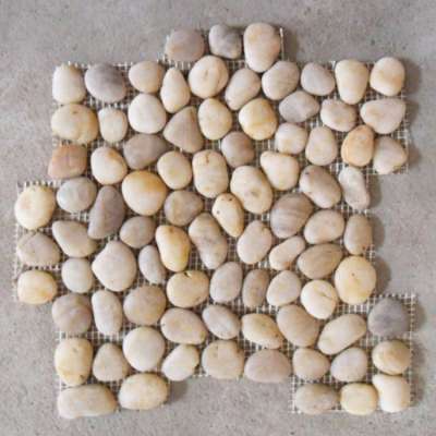 white stone pebble on mesh floor tile